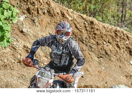 VLADIVOSTOK, RUSSIA - OCTOBER 10: competition On the edge 2016 Hard Enduro Rally with a KTM motorcycle. The hardest enduro rally in the world. October 10, 2016 in Vladivostok, Russia