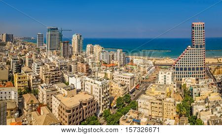 TEL AVIV, ISRAEL - JUNE 18, 2015: Aerial view of the city buildings, beach, riviera and hotels.