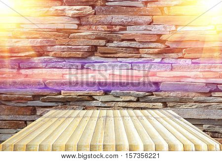 bamboo shelves wood top empty and floor ceiling in stone wall background with reflect light for product display
