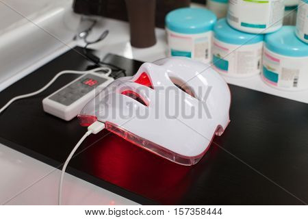 Light rejuvenating mask for facial skin therapy.