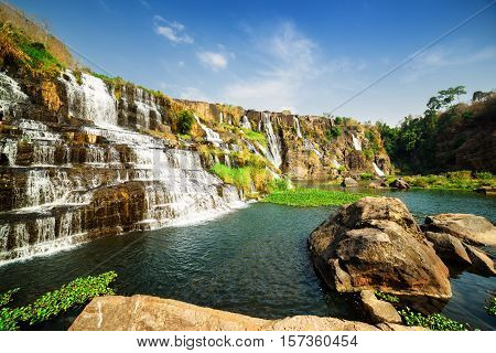 Beautiful Natural Cascading Waterfall With Crystal Clear Water