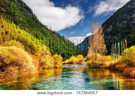 View Of Mirror River With Crystal Clear Water Among Mountains
