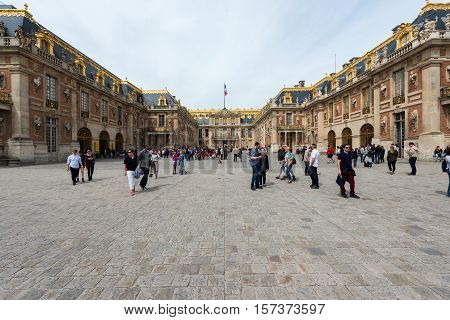 Versailles France - May 7 2016: Tourist visit famous palace Versailles royal chateau. The Palace Versailles is famous place in France.