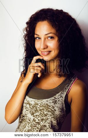 young pretty taned girl close up portrait smiling confident brunette warm, lifestyle real people concept