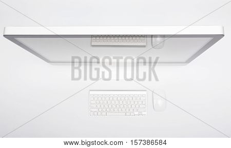 Top view monitor computer retina display mouse keyboard and blank screen on white table