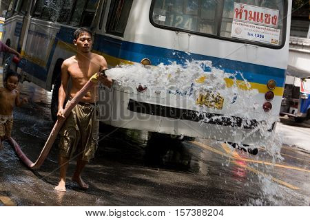Bangkok, Thailand - April 13, 2008 : 
During Songkran the Thai New Year's festival. Major streets are closed for traffic, and are used as arenas for water fights.