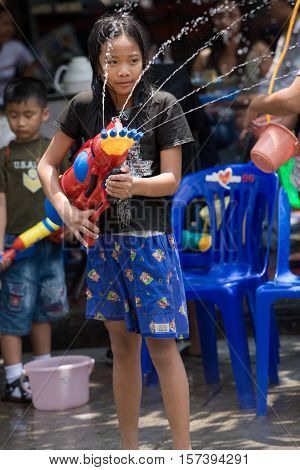 Bangkok, Thailand - April 13, 2008 : 
Children play with water guns during Songkran, the Thai New Year's festival.