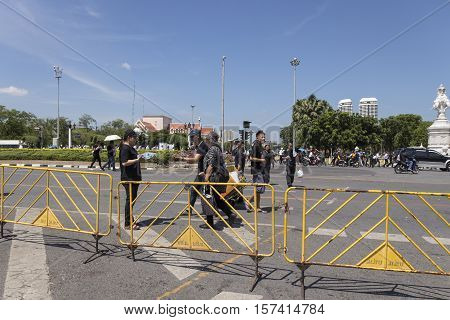 BANGKOK THAILAND - OCT 23 : snap shot of people at Ratchadamnoen Klang road on the way to Sanam Luang while the funeral of king Bhumibol Adulyadej in Grand Palace on october 23 2016