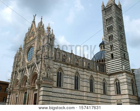 The Duomo of Siena which was built in the 12th and 13th centuries is one of the prettiest churches in Gothic style in Italy