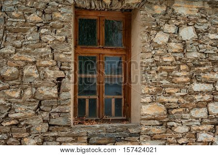 Window at one old Bulgarian house in the village of Kovachevitsa, Bulgaria