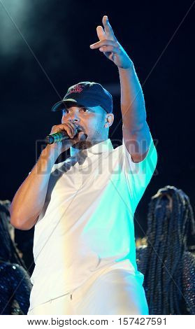 NEWPORT, ISLE OF WIGHT, UK - SEPTEMBER 9 2016:   Leighton Walsh aka Walshy Fire  performing on stage with Major Lazer at Bestival festival on the Isle of Wight