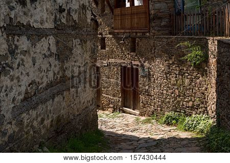 Summer time along the streets of the village of Kovachevitsa, Bulgaria