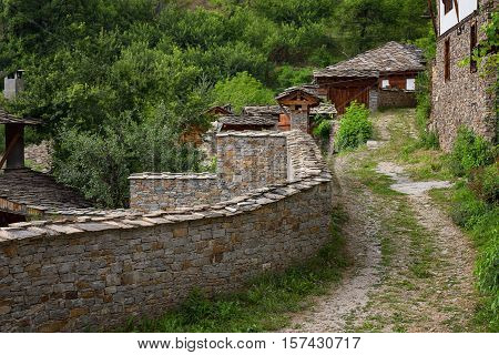 Summer time along the streets of the village of Kovachevitsa, Bulgaria