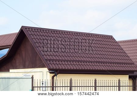 Decorative Metal Tile On A Roof. Types Of A Roof Of Roofs