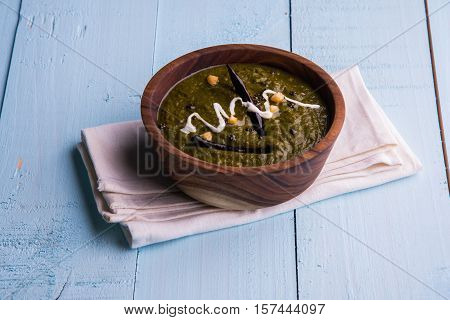 corn flour flat bread or roti or Makki Ki Roti with sarso da Saag or mustard leaves curry, Indian Food popular in winter season in north india