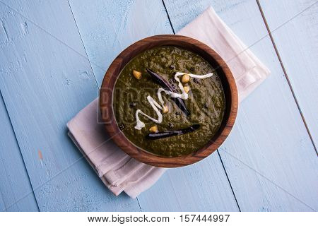 corn flour flat bread or roti or Makki Ki Roti with sarso da Saag or mustard leaves curry, Indian Food popular in winter season in north india