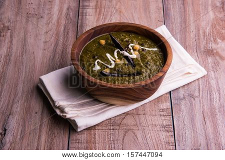 corn flour flat bread or roti or Makki Ki Roti with sarso da Saag or mustard leaves curry, Indian Food popular in winter season in north india