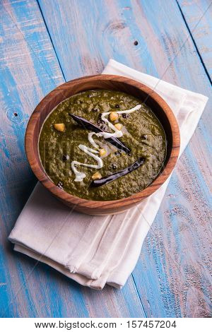 corn flour flat bread or roti or Makki Ki Roti with sarso da Saag or mustard leaves curry, Indian Food popular in winter season in north india
