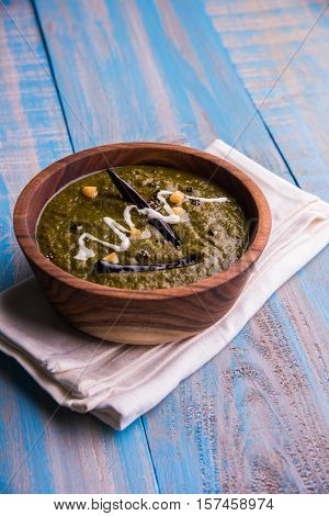 corn flour flat bread or roti or Makki Ki Roti with sarso da Saag or mustard leaves curry, Indian Food popular in winter season in north india