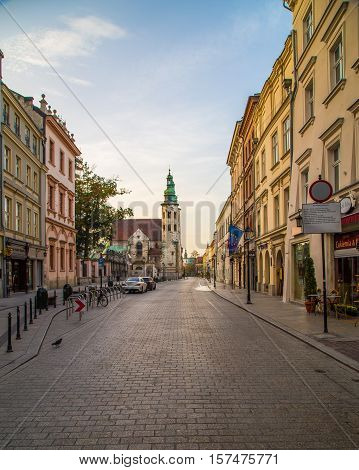 KRAKOW POLAND - 15TH OCTOBER 2016: A view along Grodzka street in Krakow during the morning. The outside of buildings and people can be seen.
