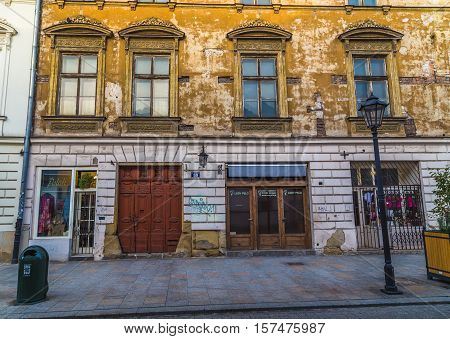 KRAKOW POLAND - 15TH OCTOBER 2016: The outside of buildings along Grodzka street in Krakow during the morning. The outside of buildings can be seen.