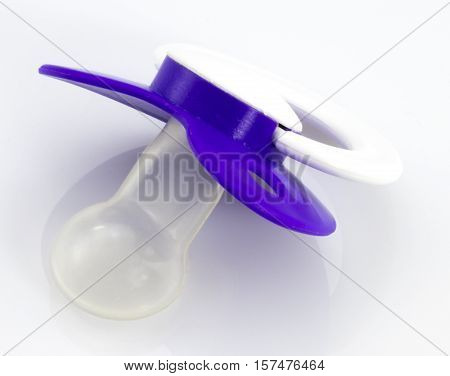 The orthodontic pacifier isolated on a white