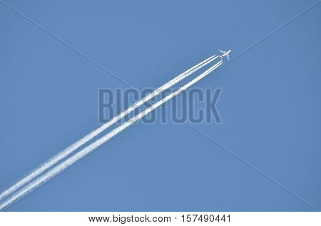 An airplane makes the sky look prettier.
