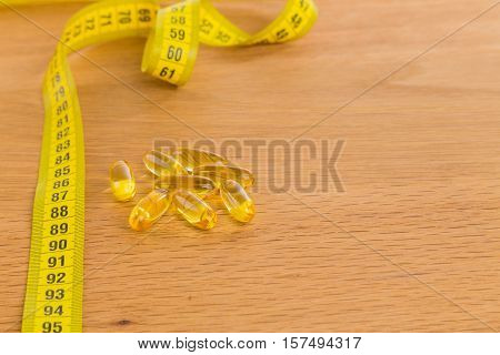 Diet pills on the table for maintaining a figure, an active lifestyle.