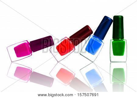 Group of bright nail polishes isolated on white background