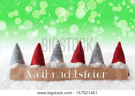 Label With German Text Weihnachtsfeier Means Christmas Party. Christmas Greeting Card With Gnomes. Sparkling Bokeh And Green Background With Snow, Snowflakes And Stars.