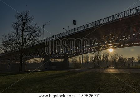 Litomerice bridge with sunset in autumn afternoon