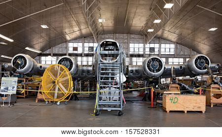 DAYTON, OHIO, USA - NOVEMBER 18, 2016: National Museum USAF is restoring the famous original WWII Memphis Belle B-17F Flying Fortress bomber, shown here in Behind the Scenes Tour in restoration area.