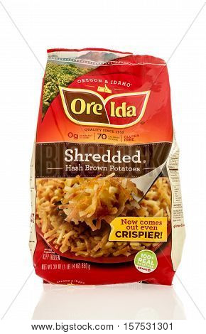 Winneconne WI - 20 November 2016: Bag of Ore Ida shredded hashbrown potatoes on an isolated background.