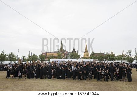 BANGKOK THAILAND - OCT 29 : the massive line up of mourners at Sanam Luang while the funeral of king Bhumibol Adulyadej in Grand Palace on october 29 2016