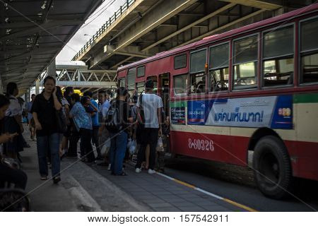 Bangkok, Thailand - November 19, 2016: Unidentified thai people waiting at the bus stop in Bangkok