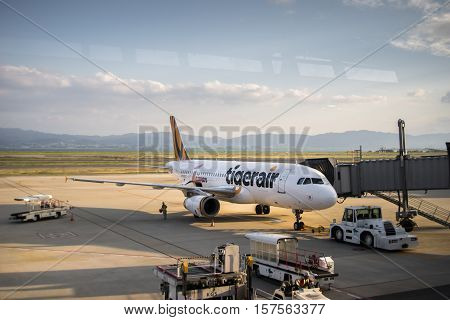 Osaka, Japan - October 2016: Tiger Air aircraft at Kansai International Airport, Osaka, Japan. Tiger Airways Singapore Pte Ltd, operating as Tigerair, is a budget airline headquartered in Singapore.
