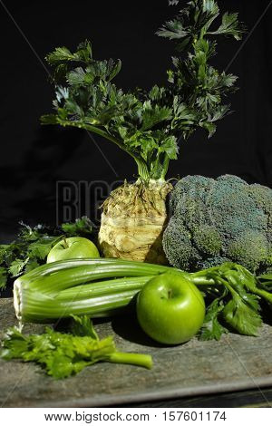 Green vegetables and fruits - celery apples celery root celeriac broccoli healthy diet concept