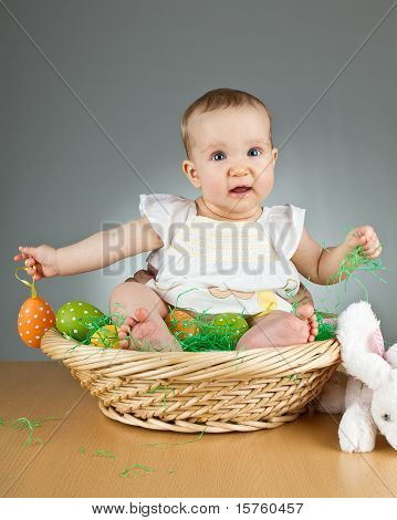 Young Cute Baby In An Easter Setting