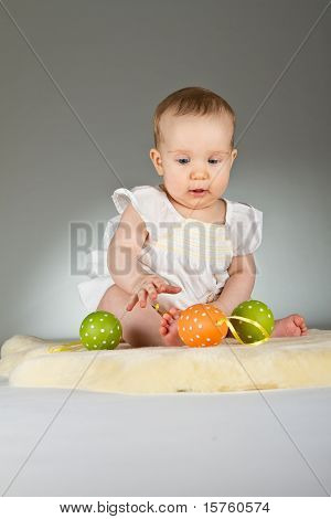 Young Cute Baby In An Easter Setting
