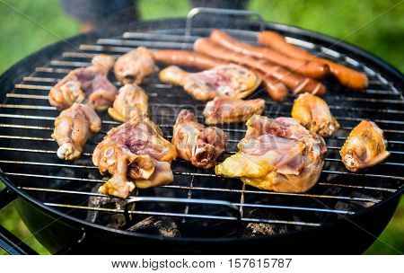 Delicious Variety Of Meat On Barbecue Grill With Char Coal.