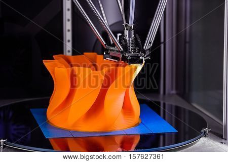 3d printer printing. Close up process of new printing technology