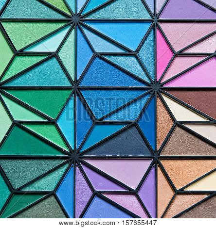 Eye Shadow palette of different colors shaped like a flower