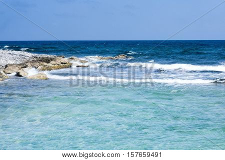 Turquoise water of the Caribbean sea, bay, shore line