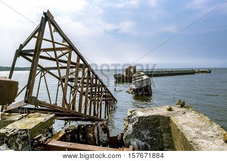 Sosnoviy Bor.Russia.25 july 2016.Abandoned rusty metal pier in the Gulf of Finland in Leningrad region