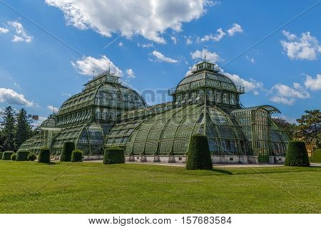 The Palmenhaus Schonbrunn is a large greenhouse in Vienna Austria featuring plants from around the world. It was opened in 1882.