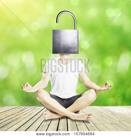 Meditating man with open iron lock instead of head on green background. Unlocking mind to find new solutions