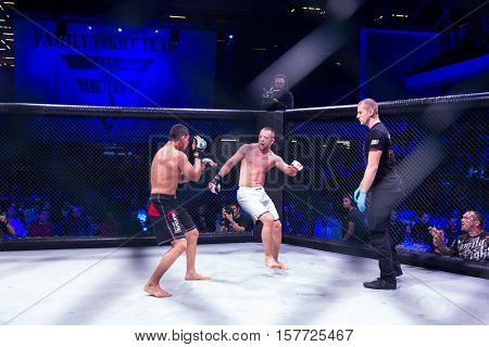 NOVI SAD SERBIA - NOVEMBER 05 2016 : MMA - SBC FIGHT TURNAMENT. ATHLETES IN THE RING EXTREME SPORT. FIGHT NIGHT PROFESIONAL ATHLETESSELECTIVE FOCUS WITH SHALLOW DEPTH OF FIELD NOVEMBER 05 2016 NOVI SAD SERBIA