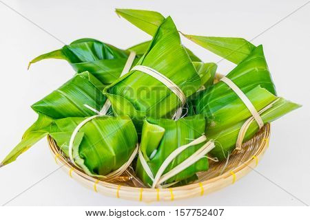 Traditional Thai food style Thai dessert made from banana and glutinous rice wrap with pandan (Khao Tom Mat)