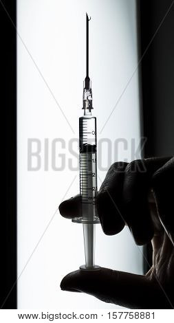 Doctor inject the medicine for the patient.
