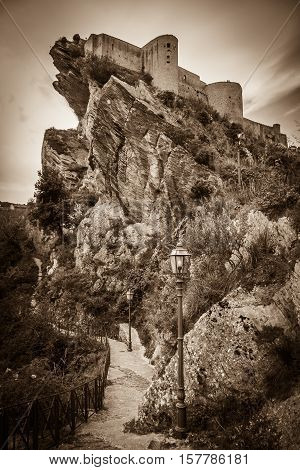 Dark view of view of Roccascalegna castle in Abruzzo
